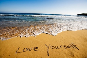 love yourself in the sand
